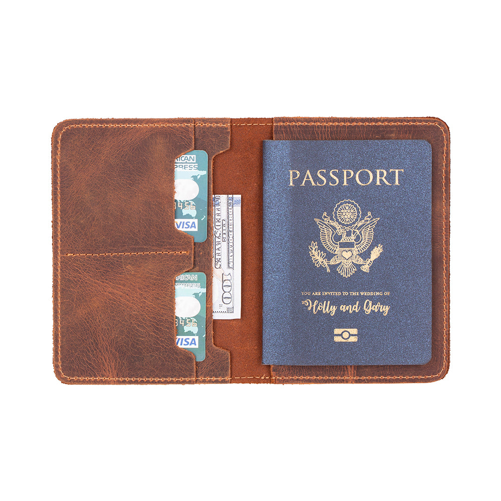 Brown leather passport holder with a passport and cards on a white background