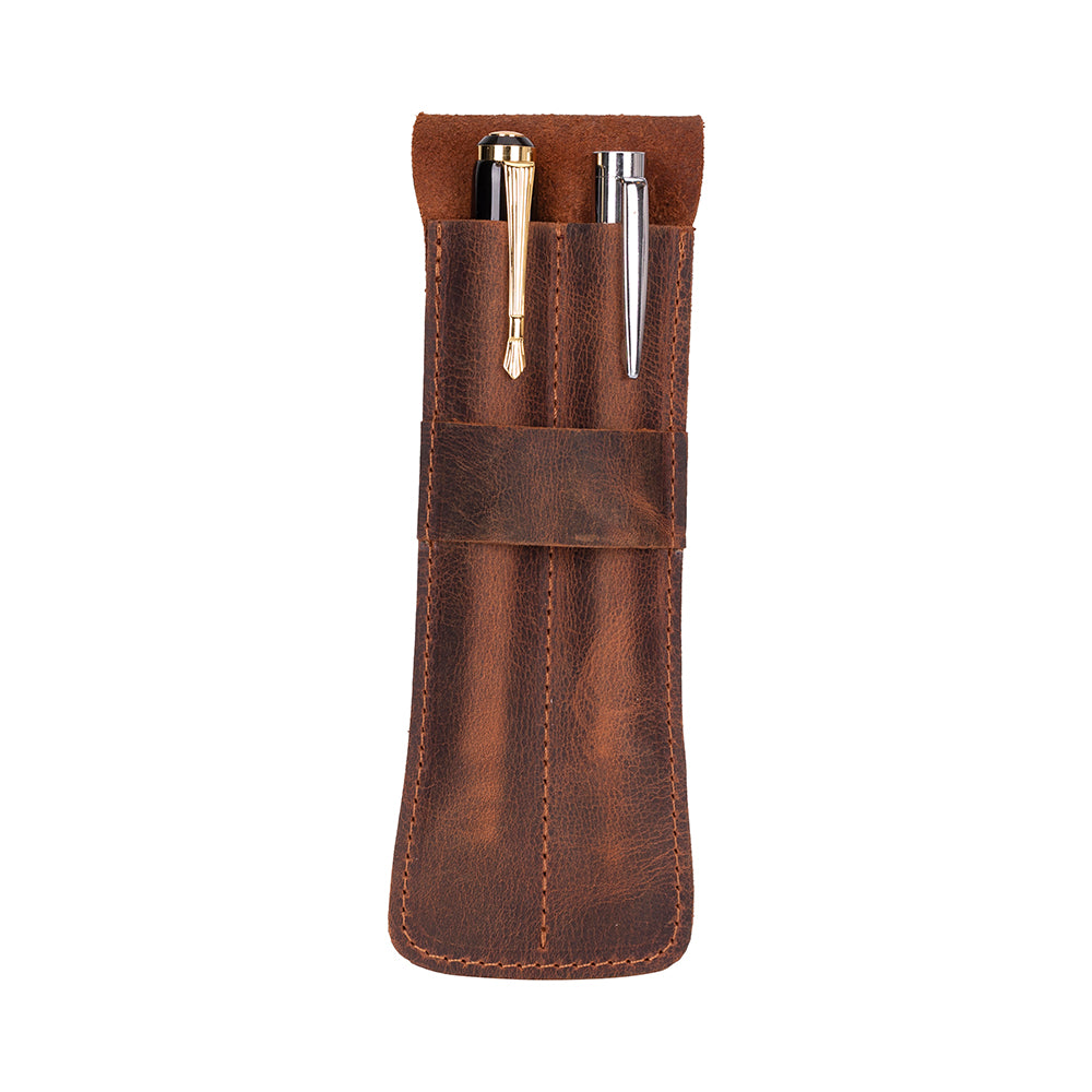 Brown leather pen holder with two pens on a white background