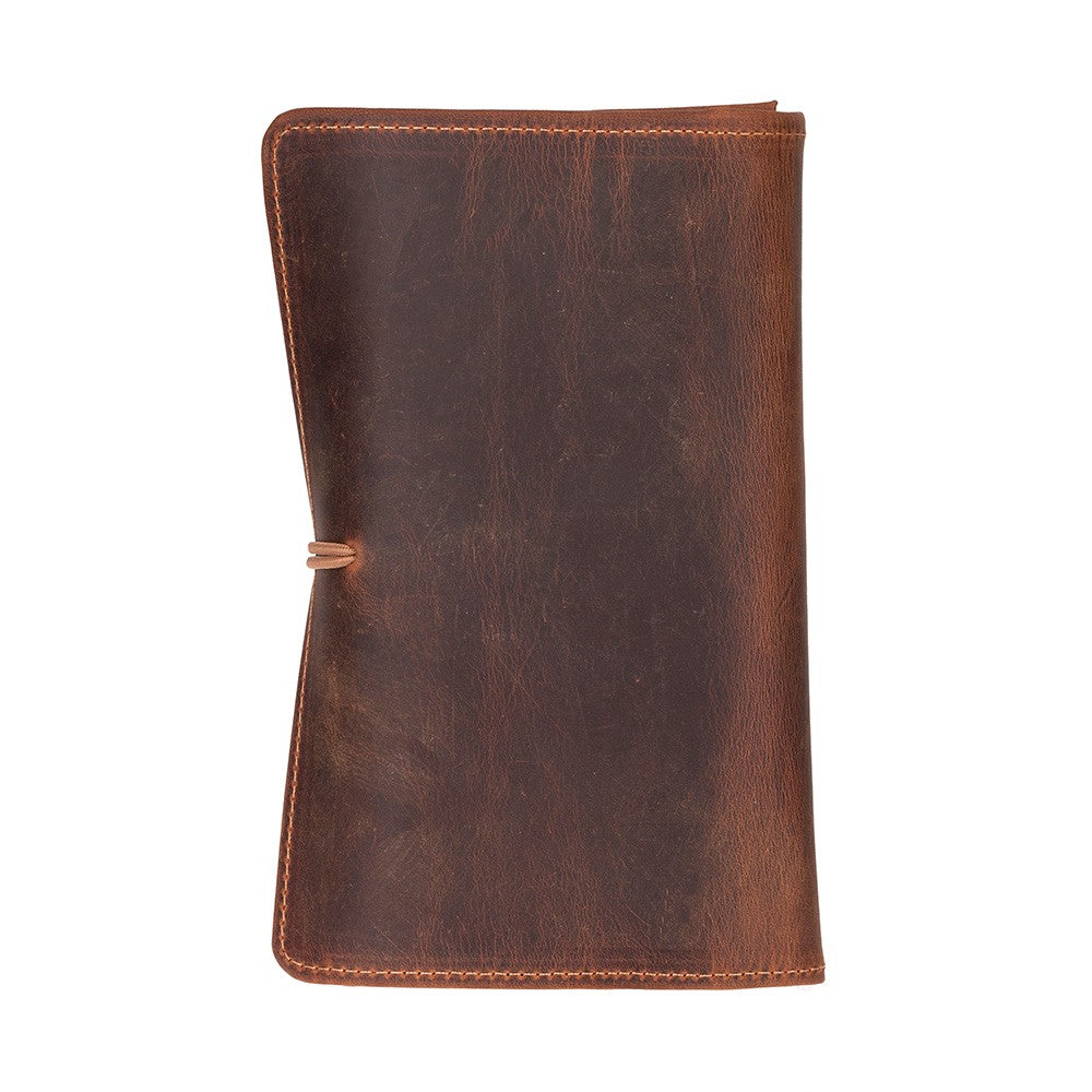 Brown leather notebook on a white background
