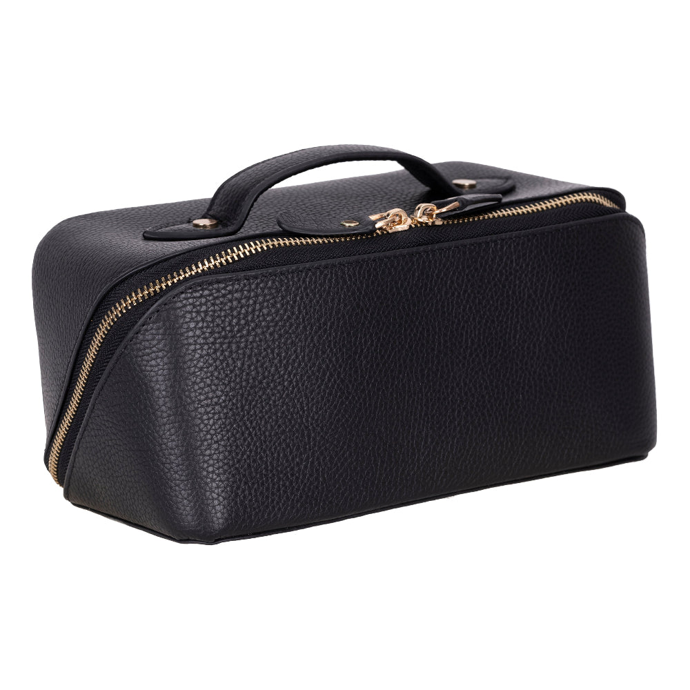 Black leather makeup case with gold zipper on a white background
