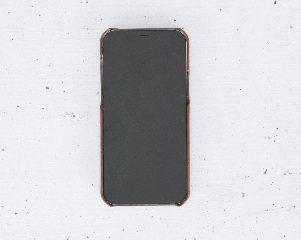 Smartphone with a black screen on a white speckled surface