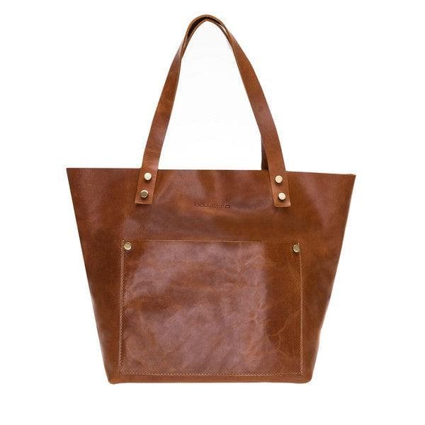 Brown leather tote bag with gold hardware on a white background