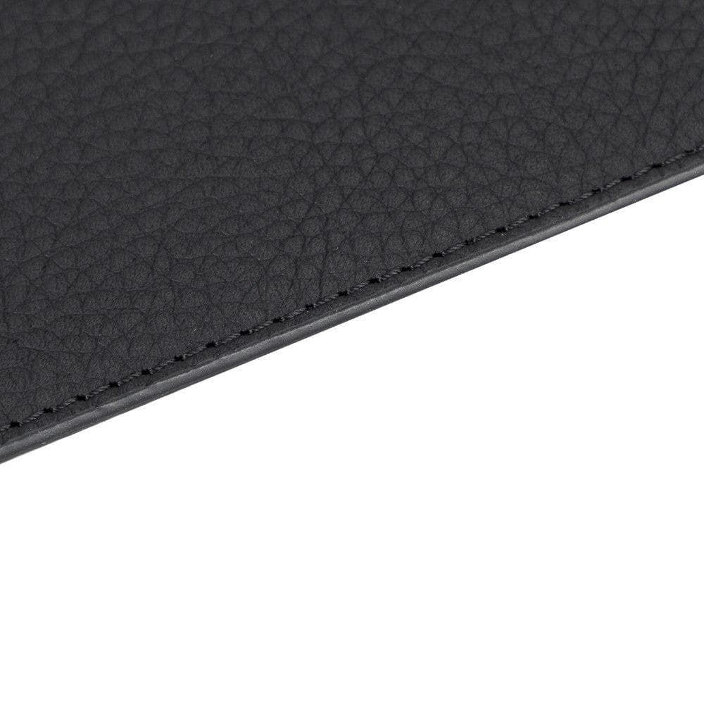 Close-up of a black mouse pad surface with a white background