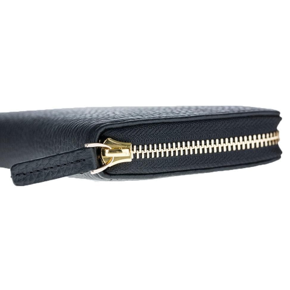 Navy blue clutch with gold zipper on a white background
