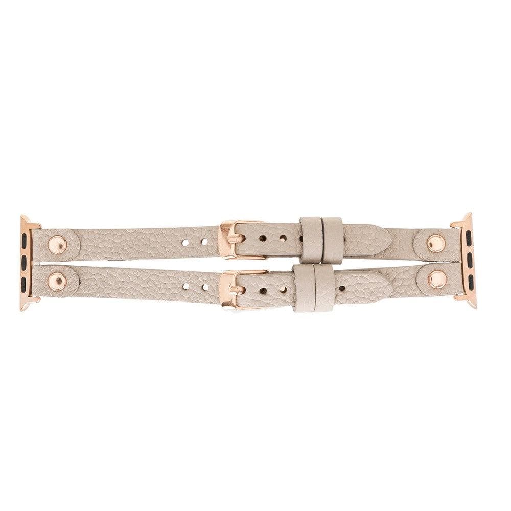 Beige watch strap with rose gold hardware on a white background