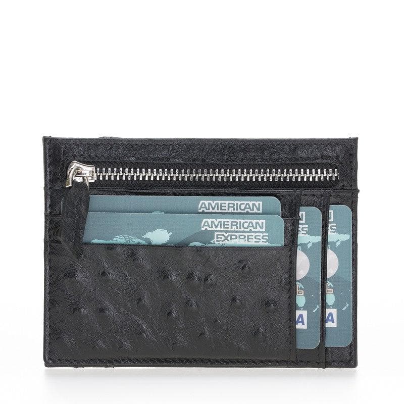 Black textured cardholder with American Express cards on a white background