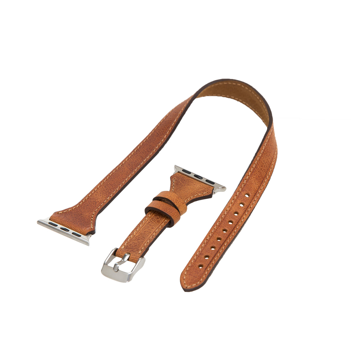 Brown leather watch strap with silver metal clasp on a white background