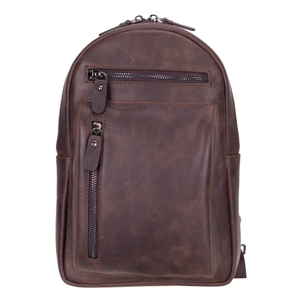 Brown leather backpack with zippers on a white background