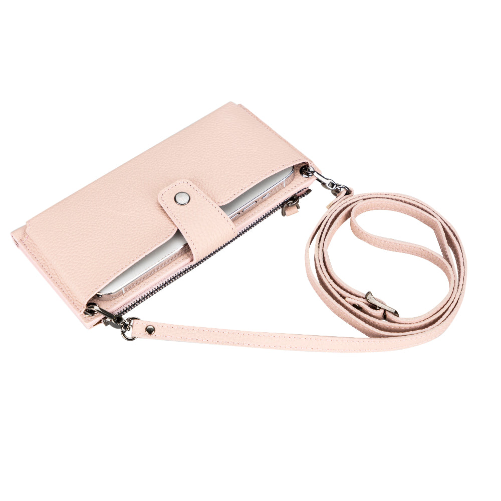 Pink crossbody bag with a strap on a white background