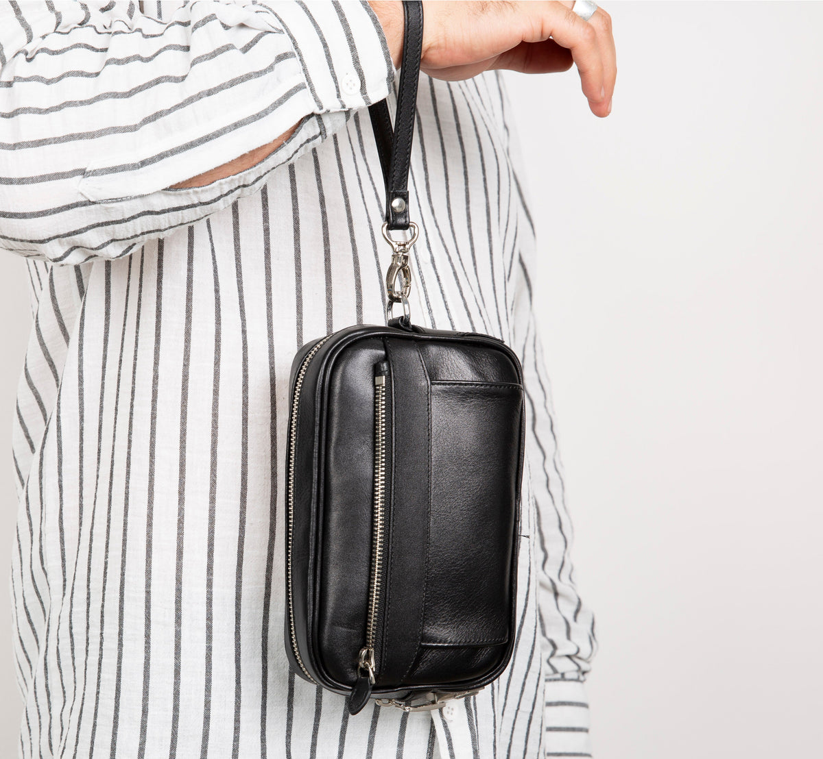 Unisex leather clutch with hidden zipper pocket and multiple compartments