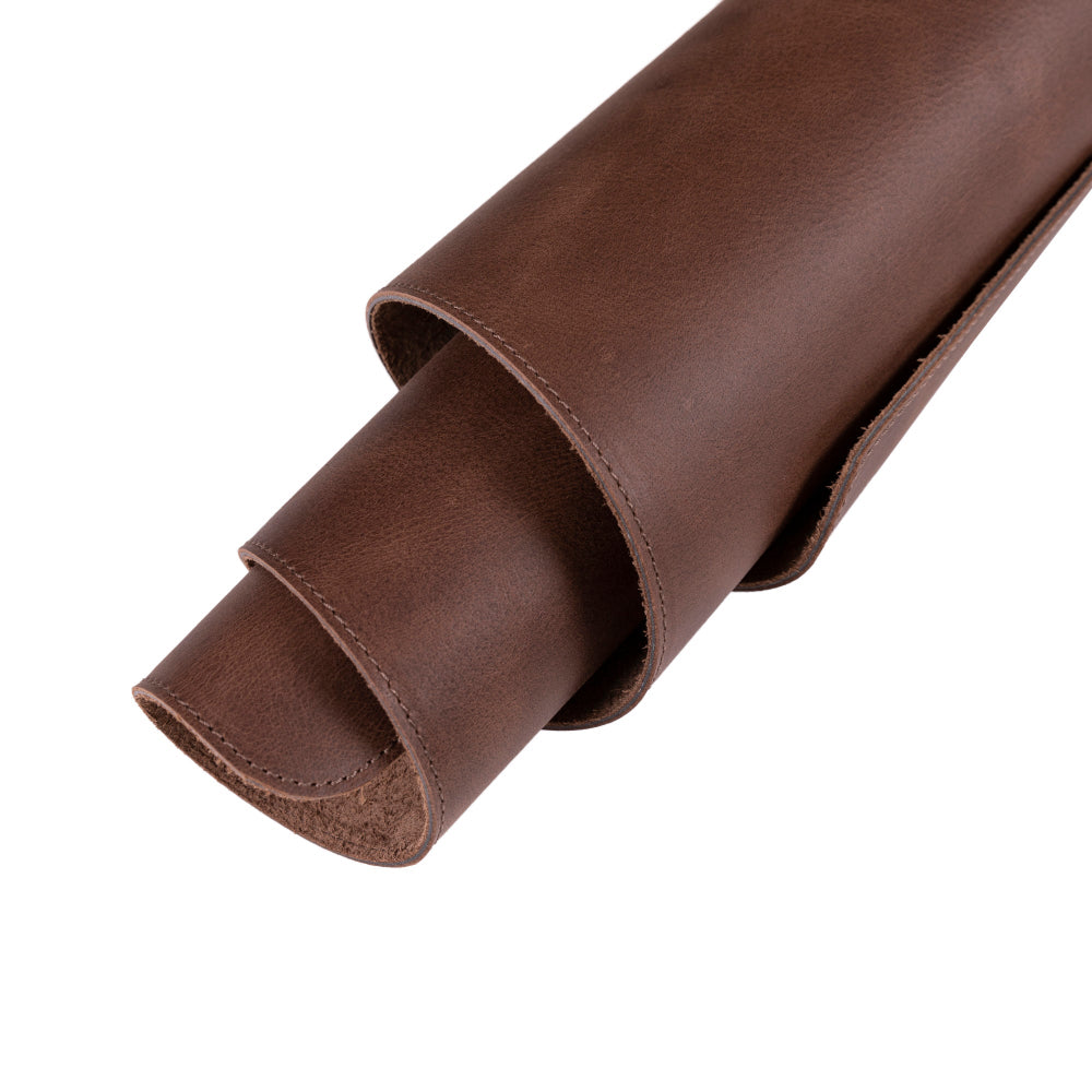 Brown leather strip on a white background