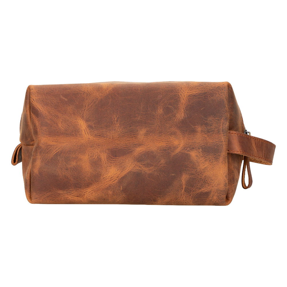 Brown leather toiletry bag on a white background