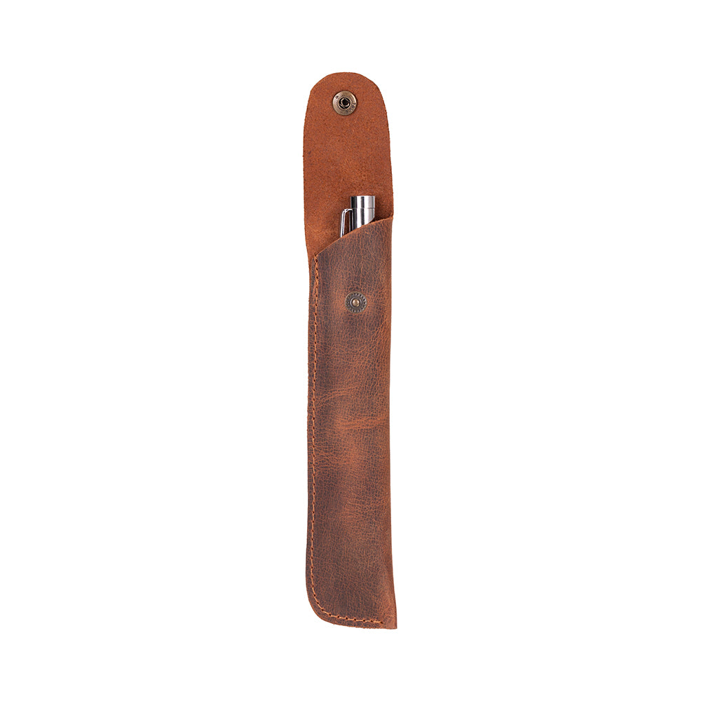 Brown leather pen holder with a pen inside on a white background