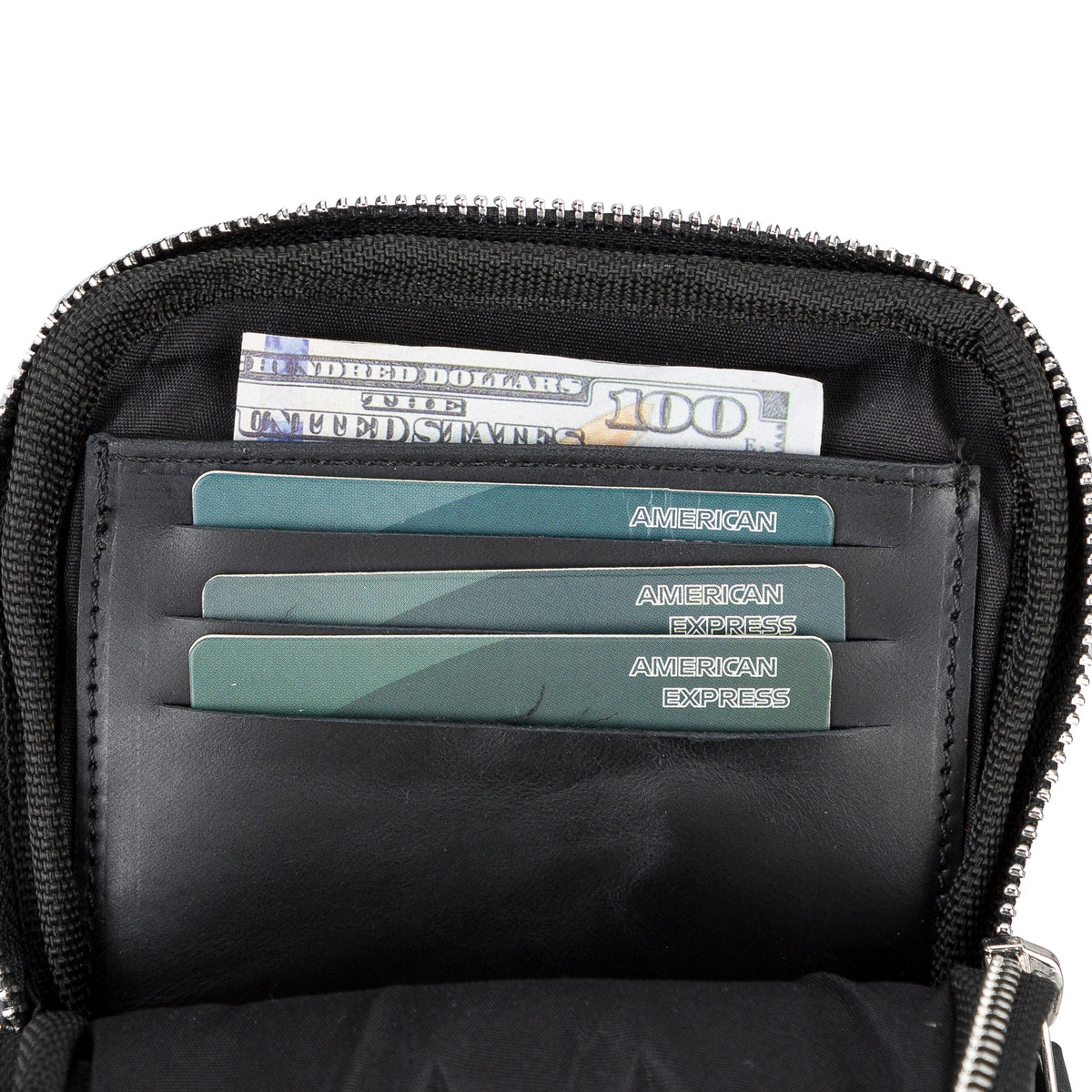 Black zippered pouch with American Express cards and a hundred-dollar bill