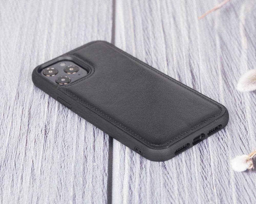 Black phone case on a light wooden surface
