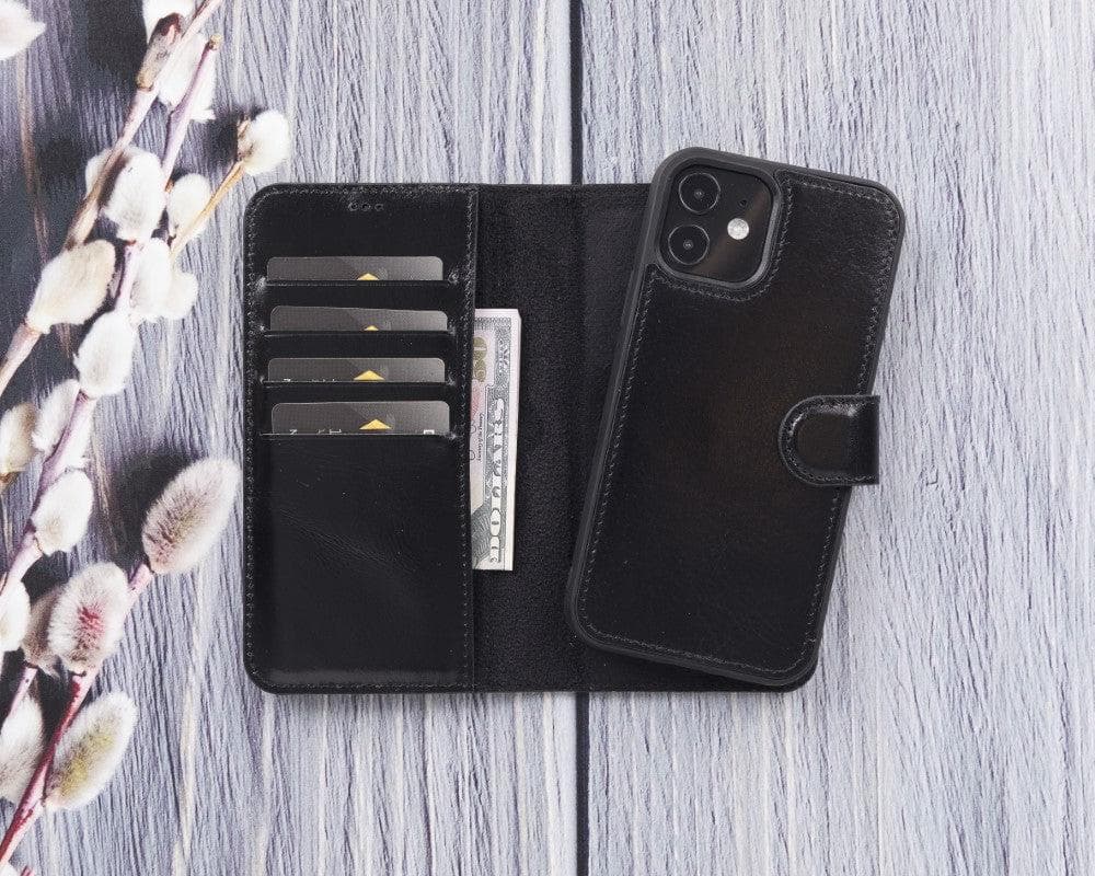 Black phone case with card slots on a wooden surface
