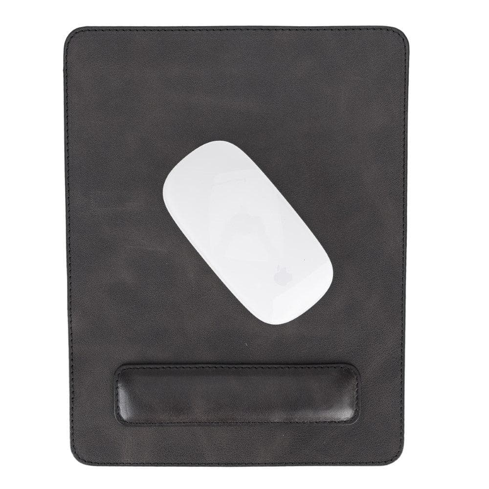 Black leather mouse pad with a white mouse on a white background