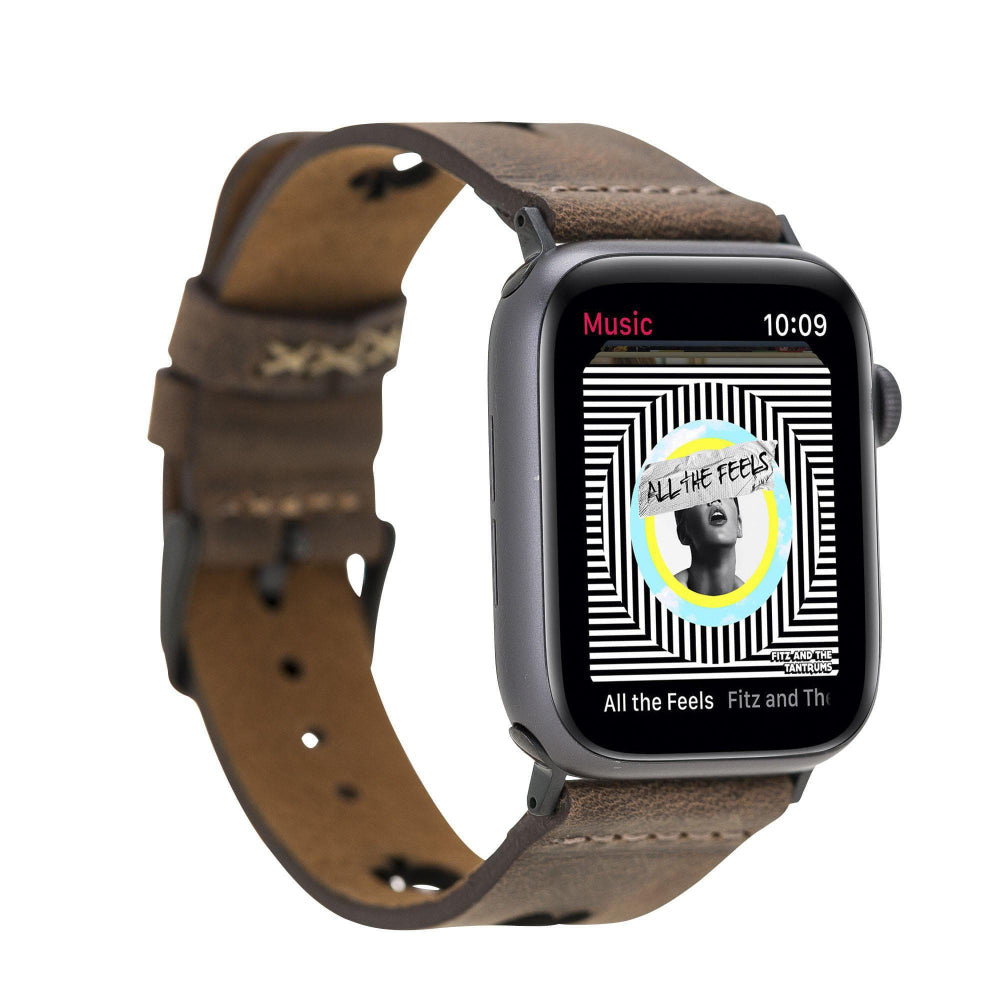 Smartwatch with a brown leather strap displaying a music app on a white background