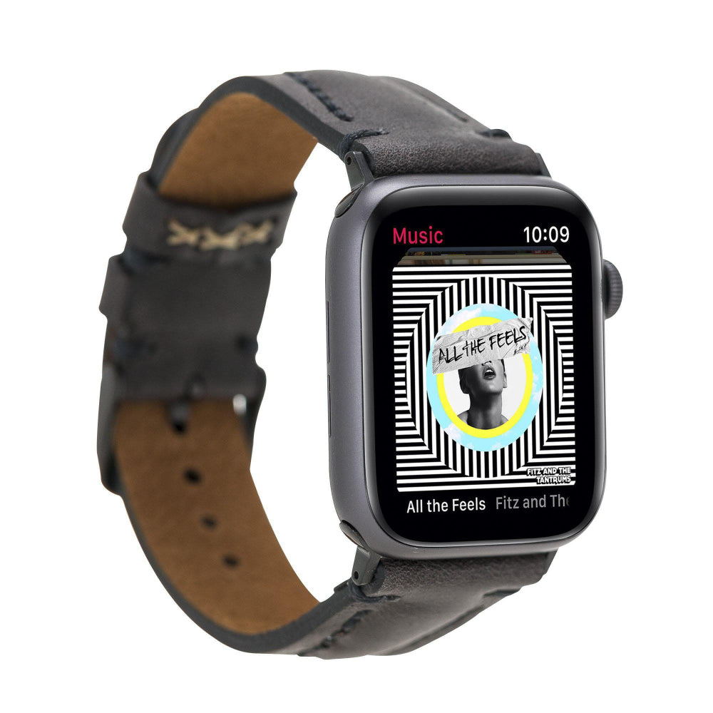 Smartwatch with a black leather strap displaying a music app interface on a white background