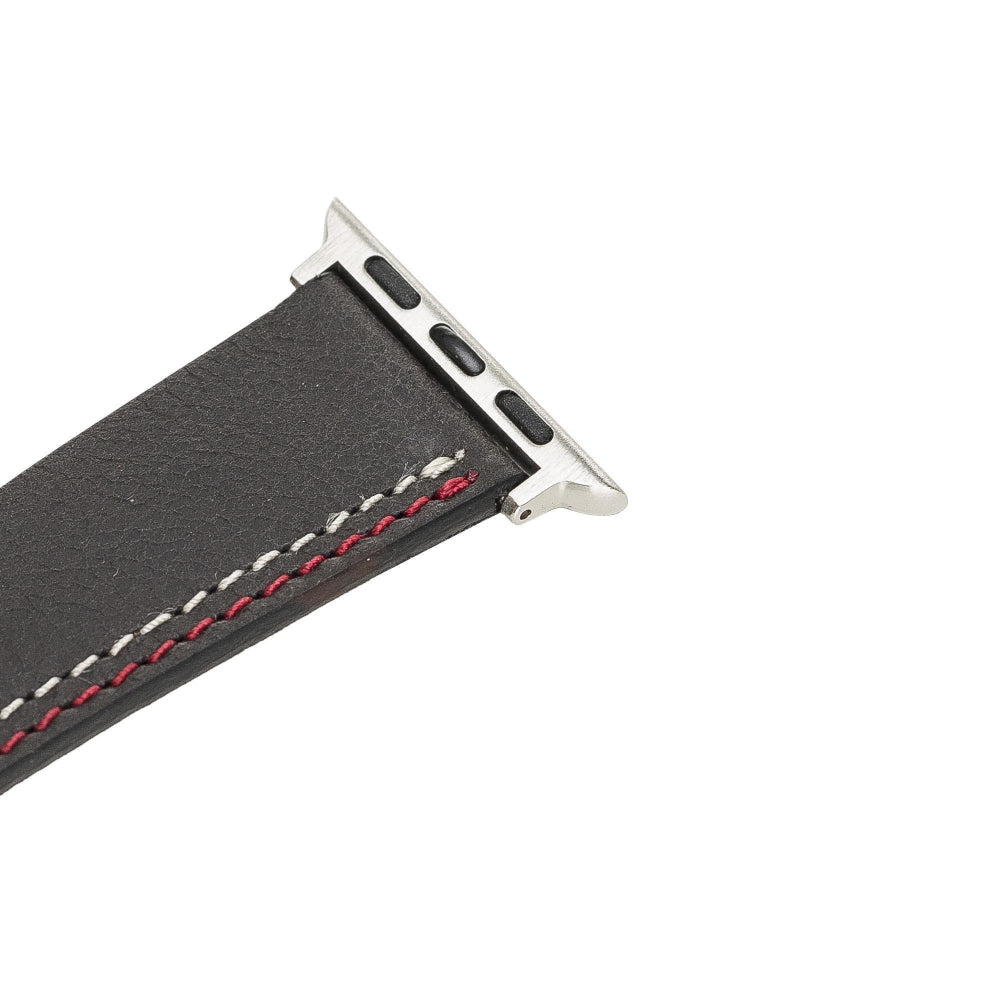 Black watch strap with red stitching on a white background