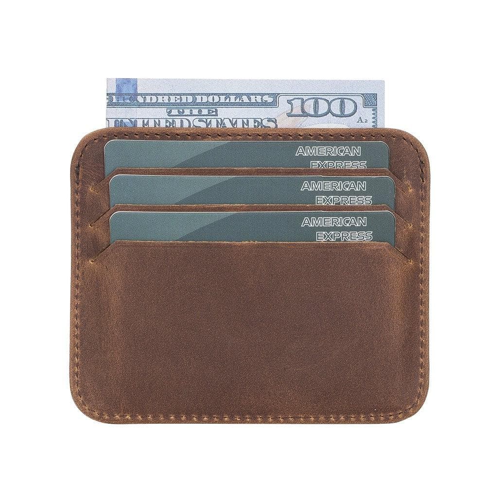Brown leather wallet with cards and a $100 bill on a white background