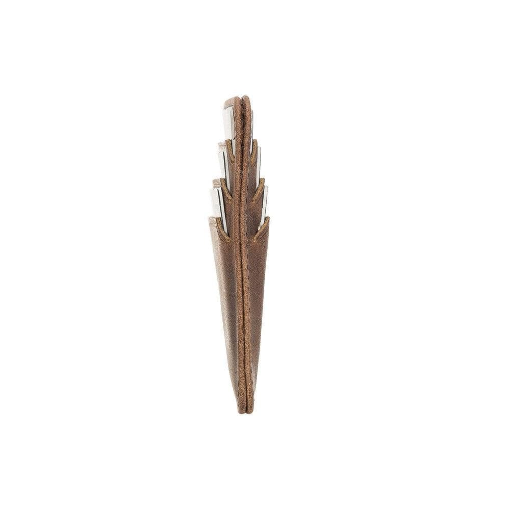Brown umbrella folded and placed inside a matching brown holder on a white background