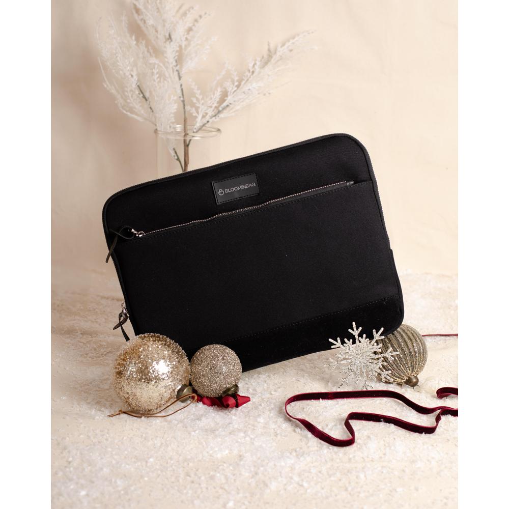 Eco-friendly laptop sleeve with vegan suede bottom and water-repellent lining