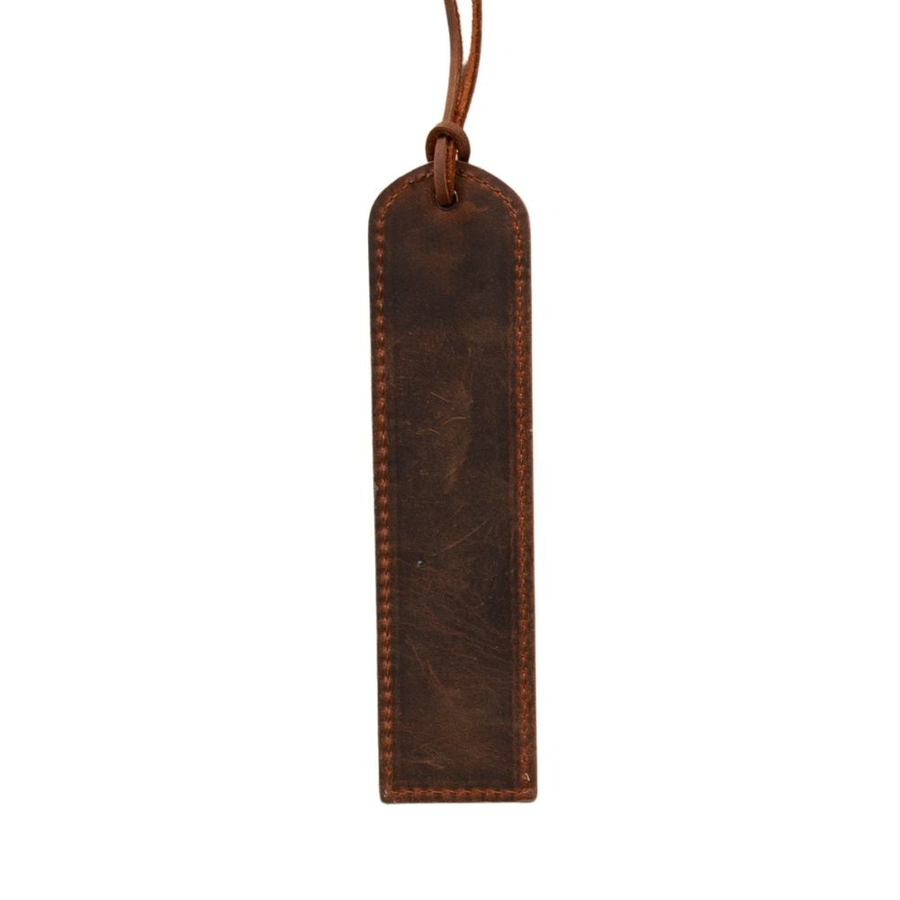 Brown leather tag with a string on a white background