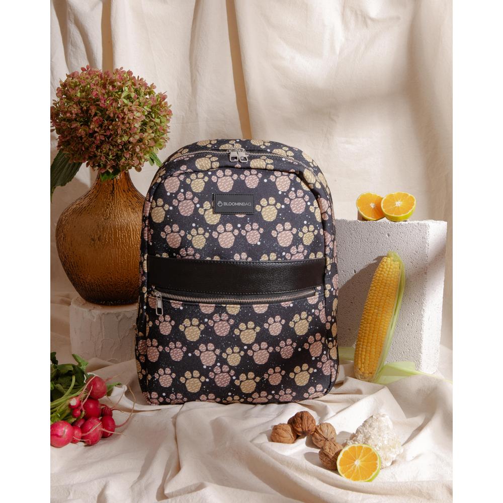 Eco-friendly cruelty-free laptop backpack with ergonomic straps and compartments